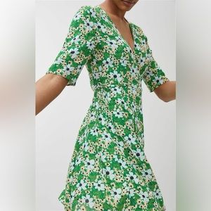 Green patterned Arket wrap dress.